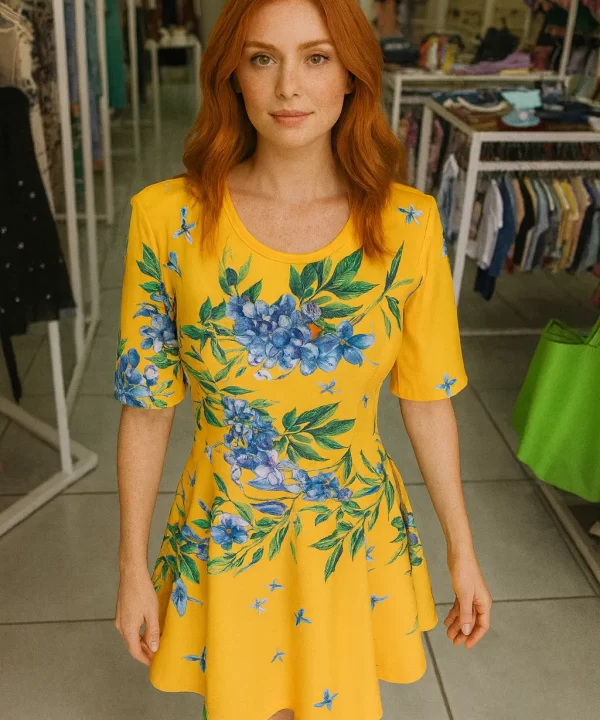 VESTIDO MANGA CURTA SAIA RODADA AMARELO COM ESTAMPA DE FOLHAS VERDE E FLORES AZUIS ZIPER NAS COSTAS- LANÇA PERFUME